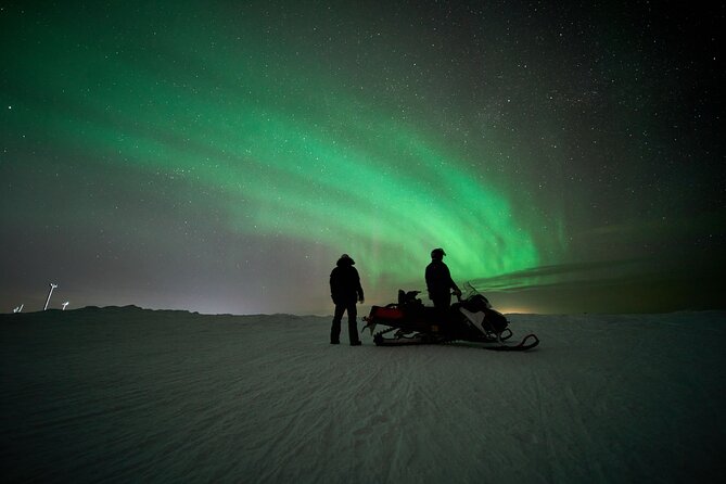 3 Hours Snowmobiling under Auroras and Night Sky - The campfire stop in the Sami-style tipi