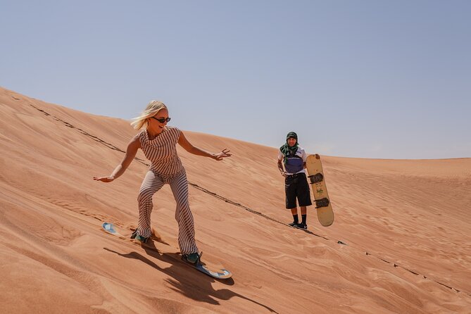 Dubai Overnight Desert Safari, BBQ & Stargazing at Al Khayma Camp - Camels, sunset, henna, and falcon photos
