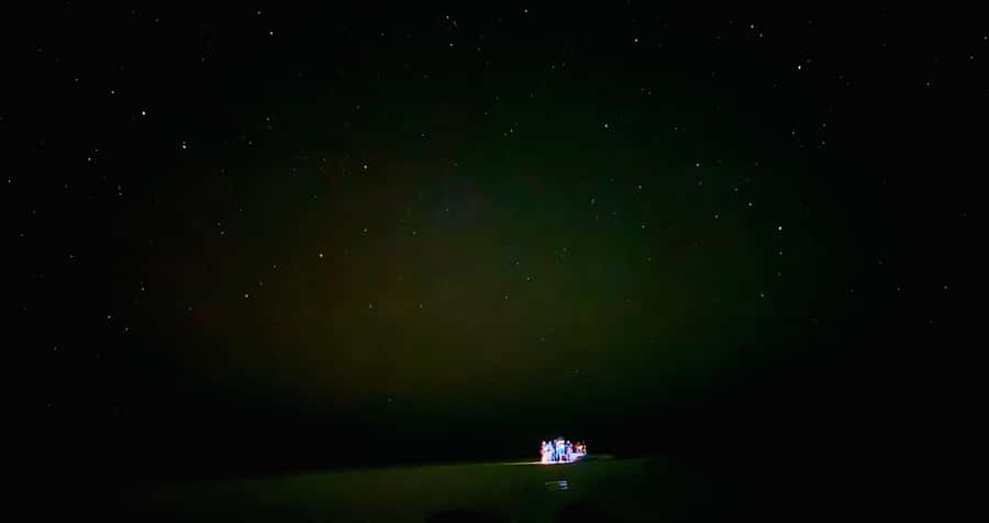 Holbox: Bioluminescence by Kayak and Stargazing. - Walking across a glowing sandbar