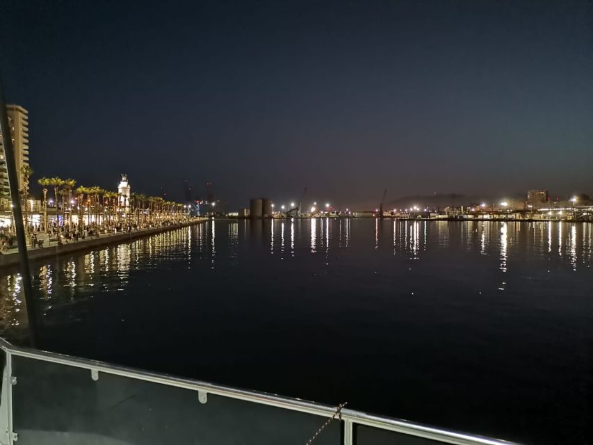 Malaga: A Sea of Stars Nighttime Stargazing Catamaran Tour - Leaving Malaga port after dark